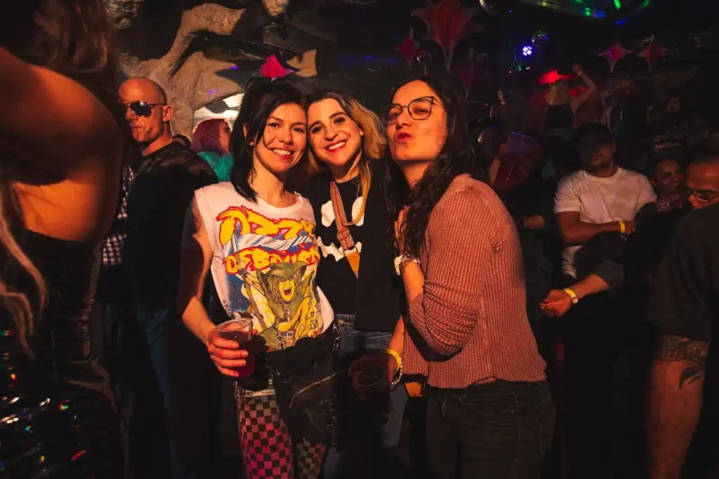 Three women smiling together