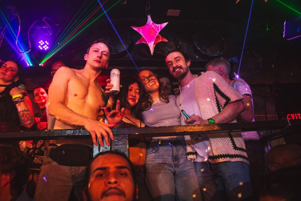 A group of friends posing on a platform