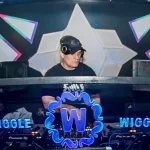 Man DJing with baseball cap