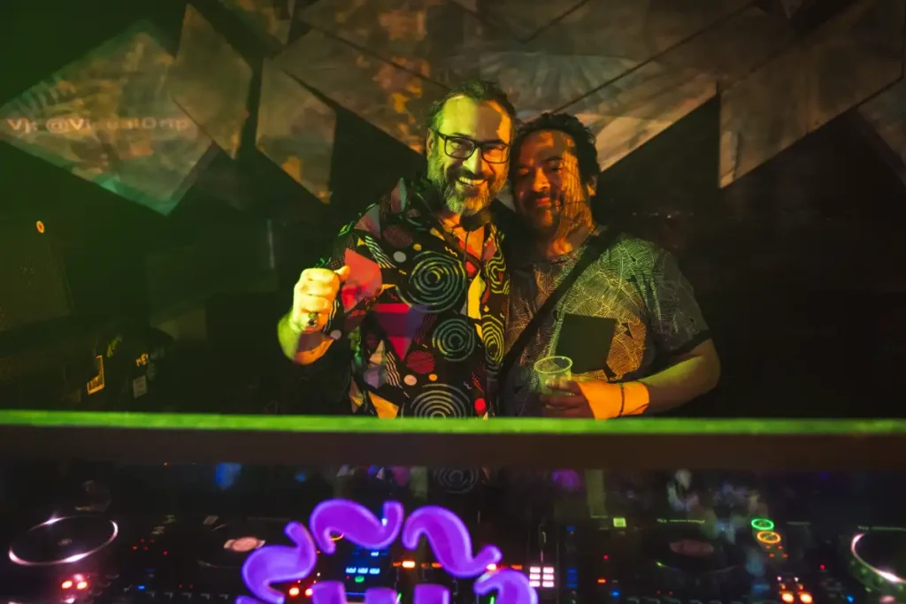 DJs smiling to camera