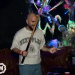 Pool player with cue