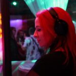 Women DJ with red hair