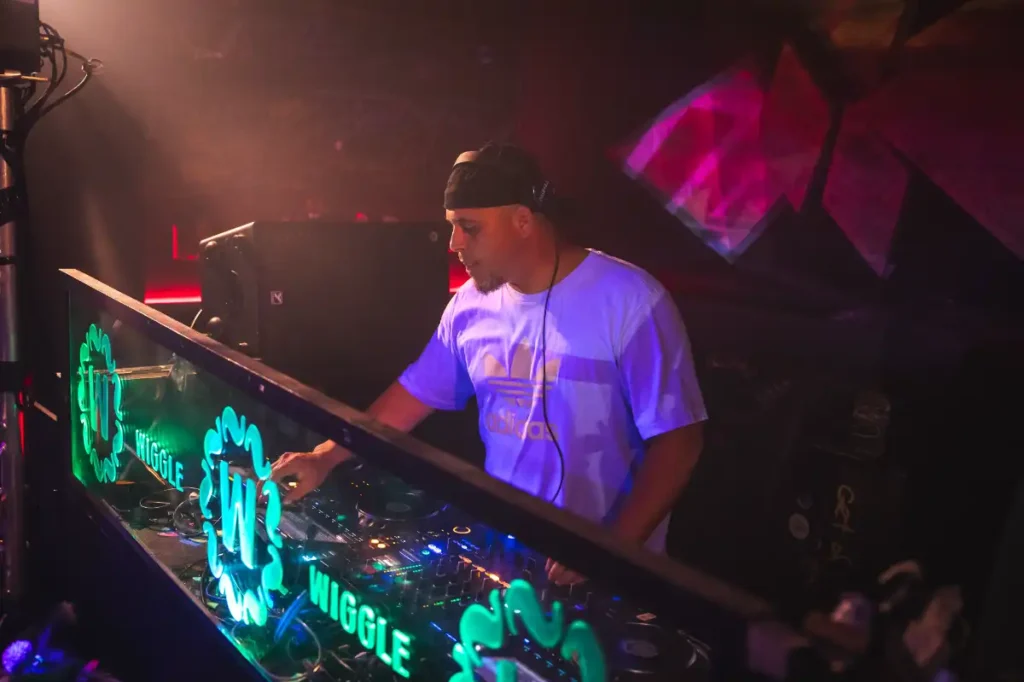 DJ with a blue shirt