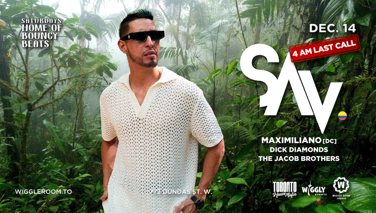 Man in white shirt with a jungle behind