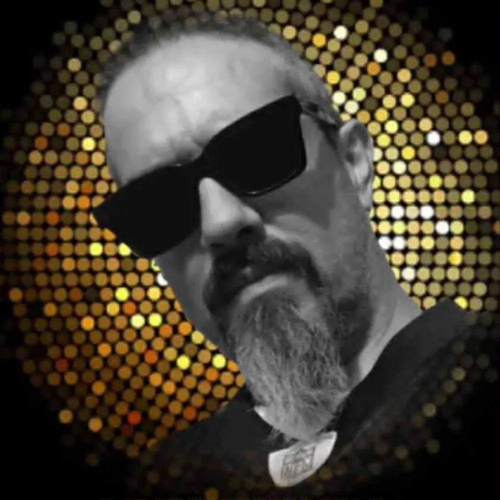 Man with sunglasses and a golden halo made of dots behind him