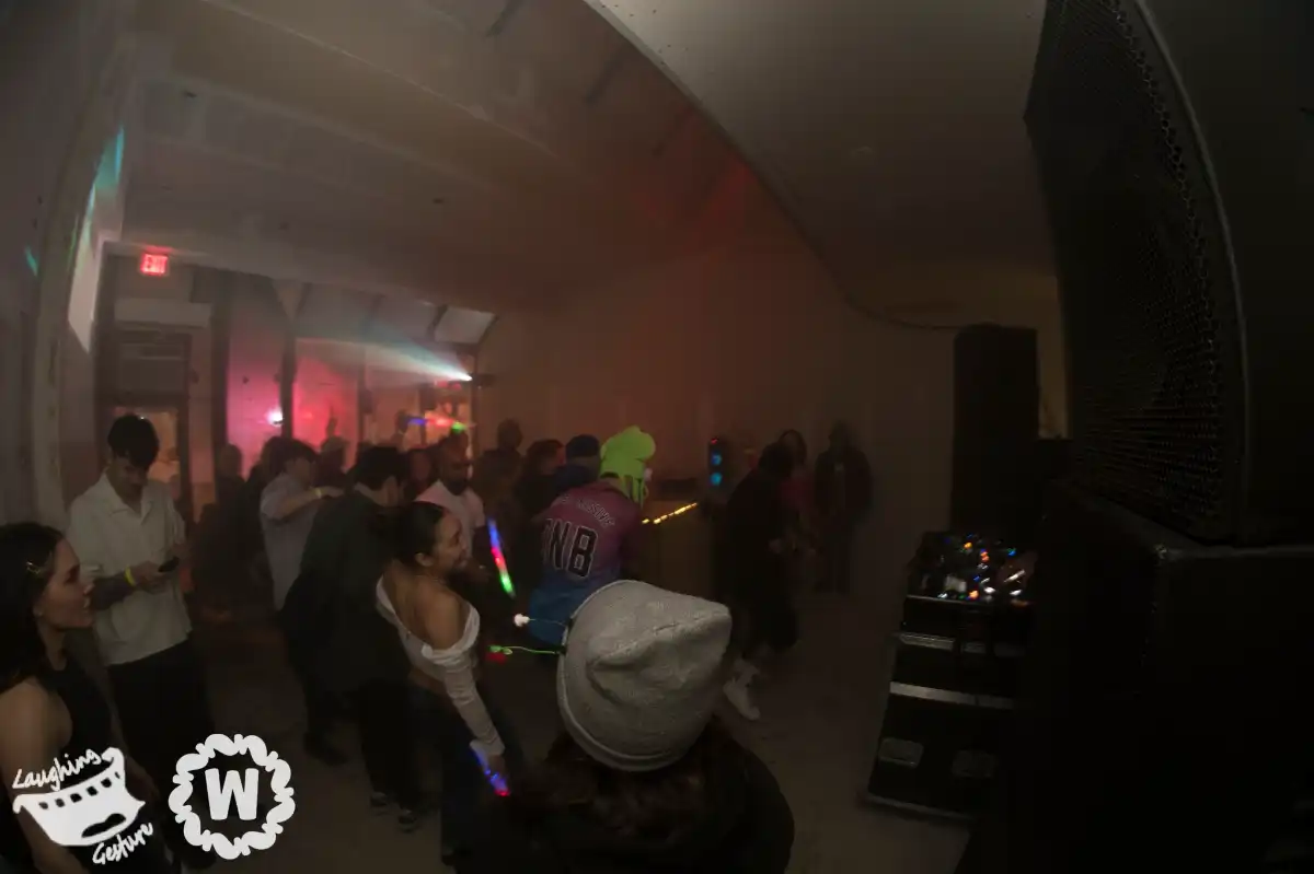 An unfinsihed room with dancers