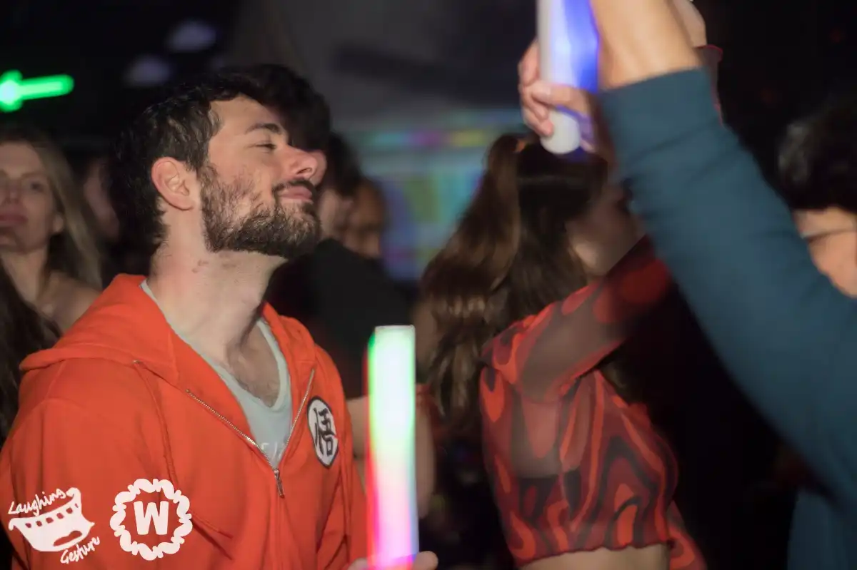 A smiling man on the dancefloor