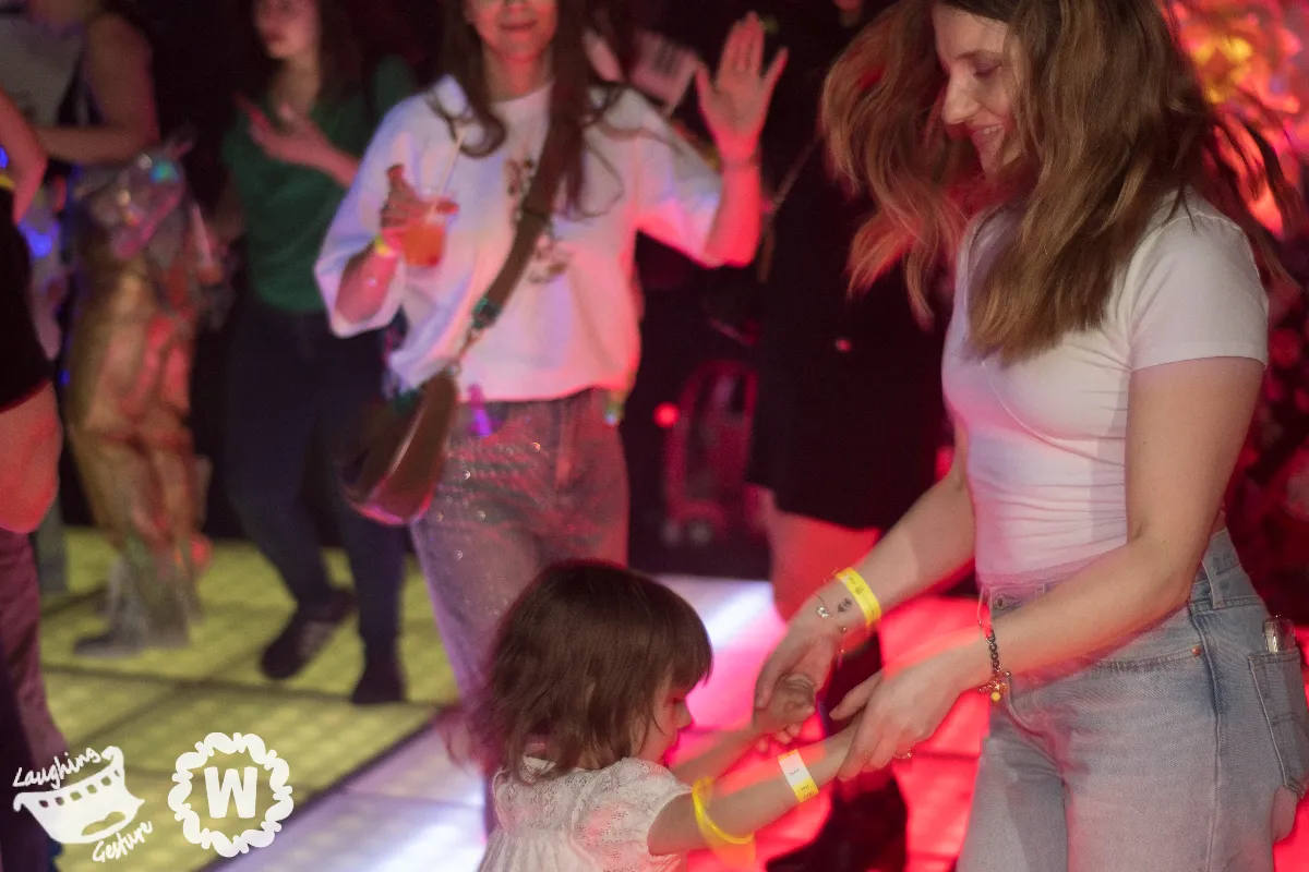 Kids on dancefloor with parents