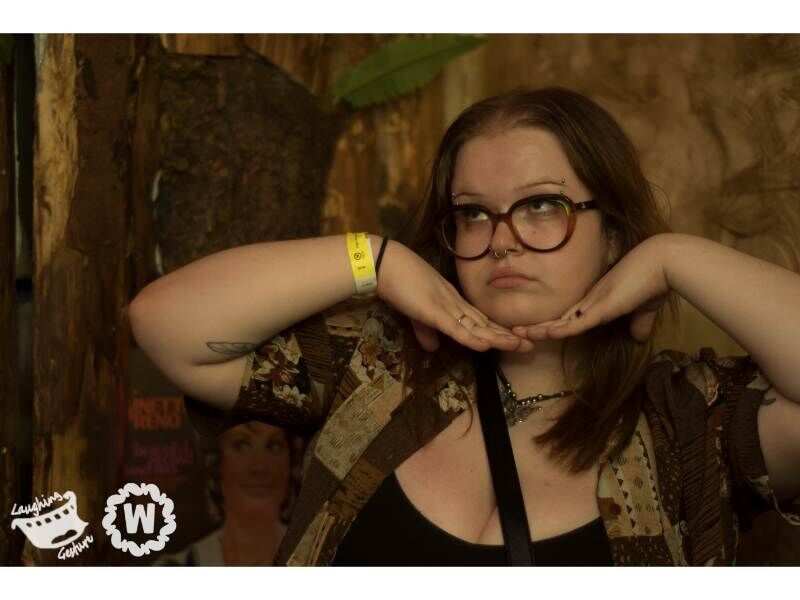 Hands under face woman