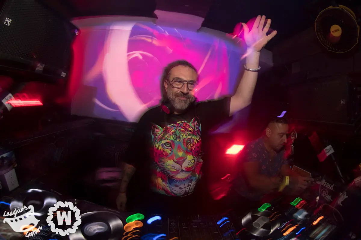 DJ TAKiN ft Santouri performing live with colorful visuals and crowd